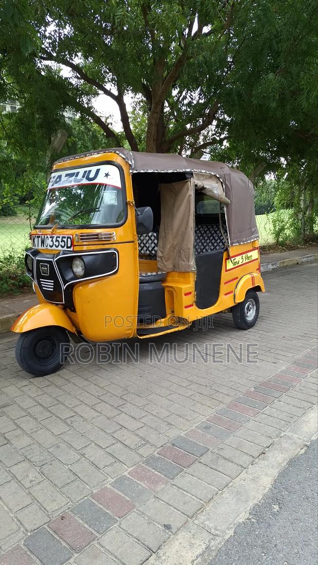 Bajaj RE 2023 Yellow - thumbnail 4
