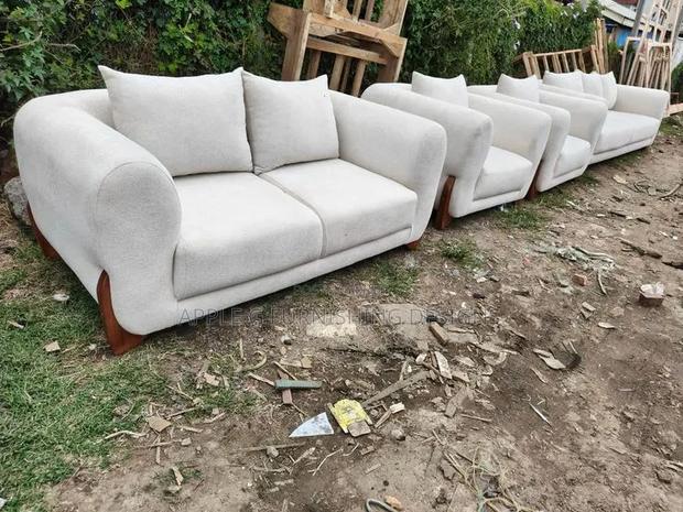 Brand New 7seater Sofa/Modern White Fabric/ Wooden Legs