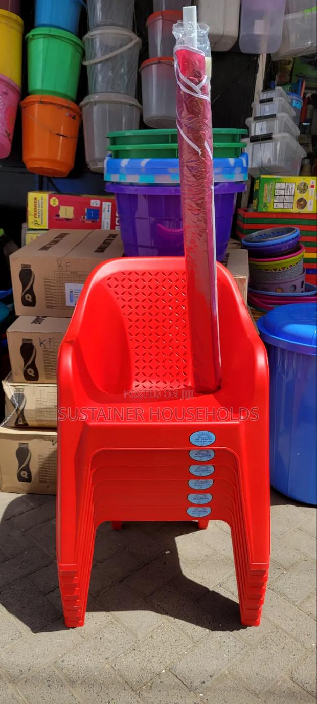 6pcs Skyplast Plastic Chairs and a Red Umbrella - main view