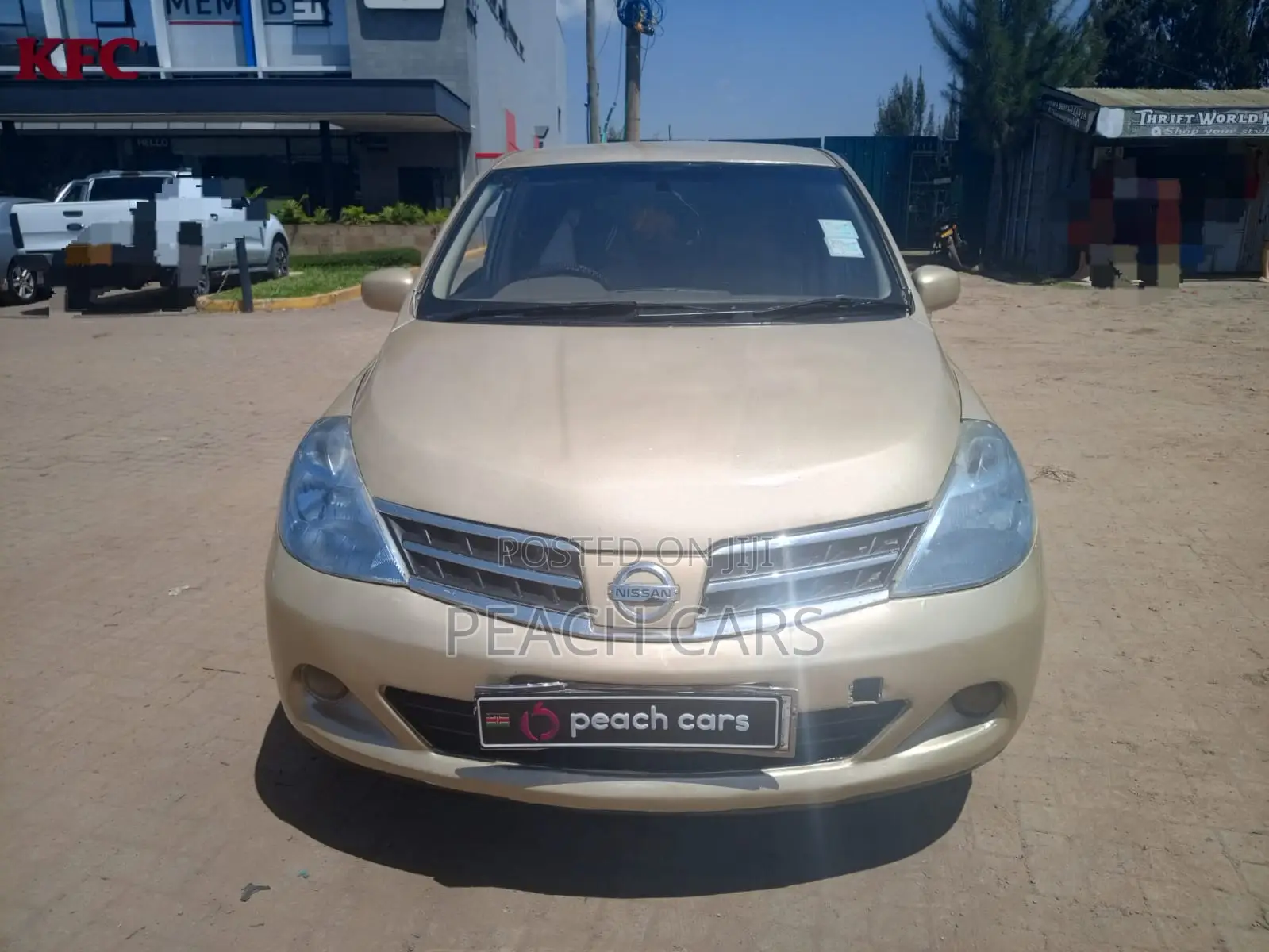 Nissan Tiida 2009 Gold