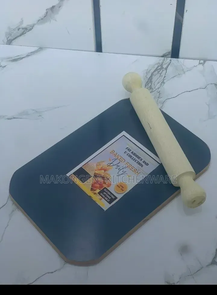Blue Cutting Board Paired With a Wooden Rolling Pin.