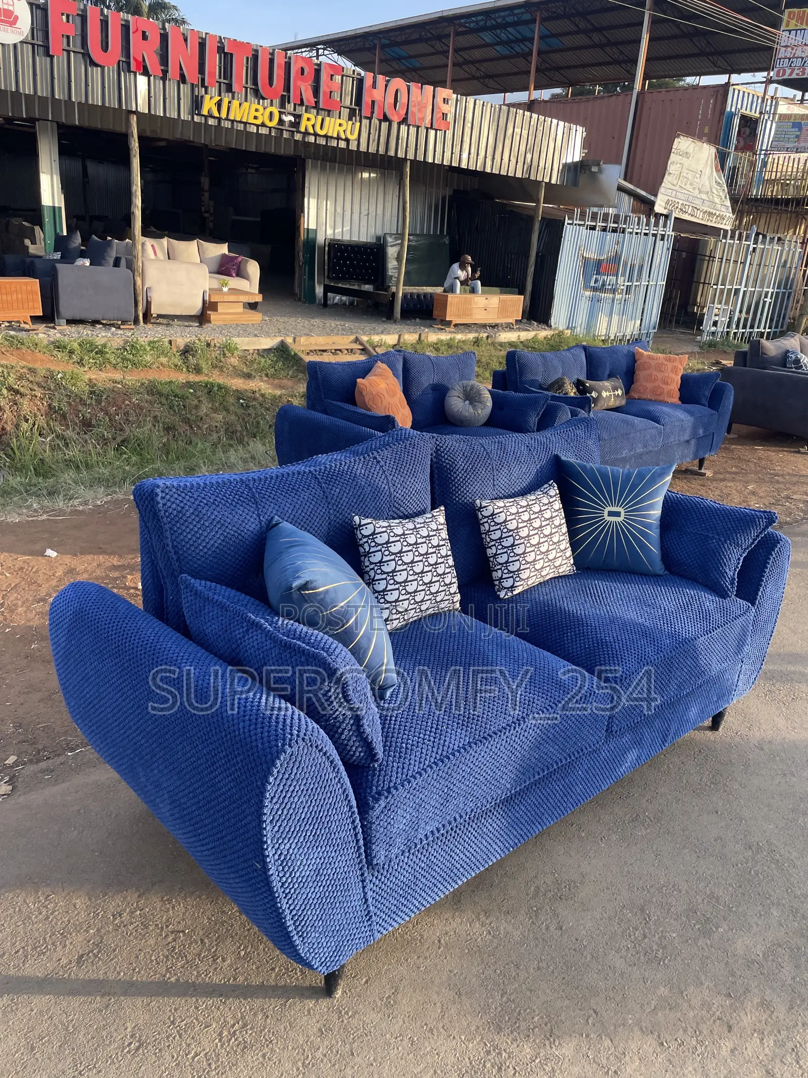 A Classic Three Seater Butterfly Super Sofa