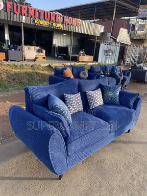 A Classic Three Seater Butterfly Super Sofa