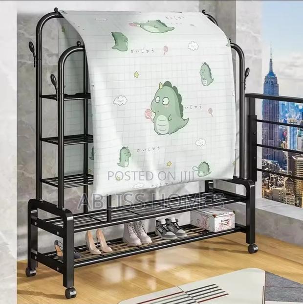 Multifunctional Clothes Rack With Side Storage Shelves