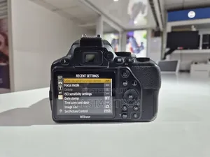 Nikon D3500 With 18-140mm Charger Strap and Battery Included.
