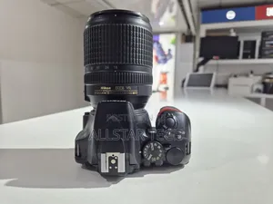 Nikon D3500 With 18-140mm Charger Strap and Battery Included.