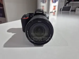 Nikon D3500 With 18-140mm Charger Strap and Battery Included.