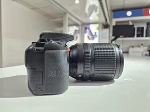 Nikon D3500 With 18-140mm Charger Strap and Battery Included.