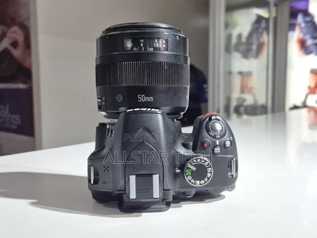 Nikon D3200 Youngnuo 50mm F1.4 - thumbnail 3