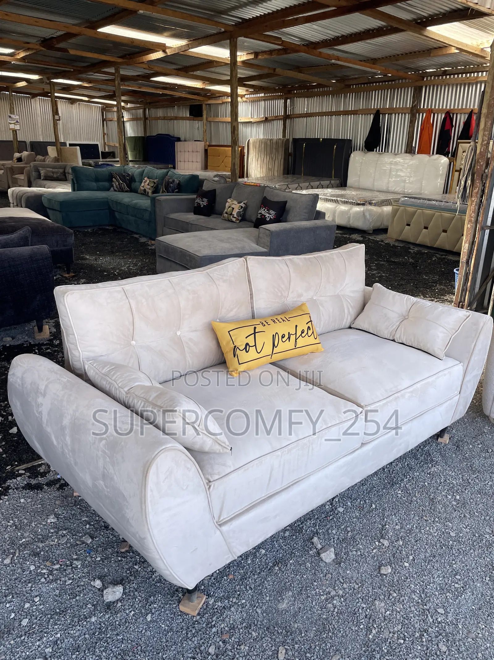 A Classic Three Seater Butterfly Super Sofa