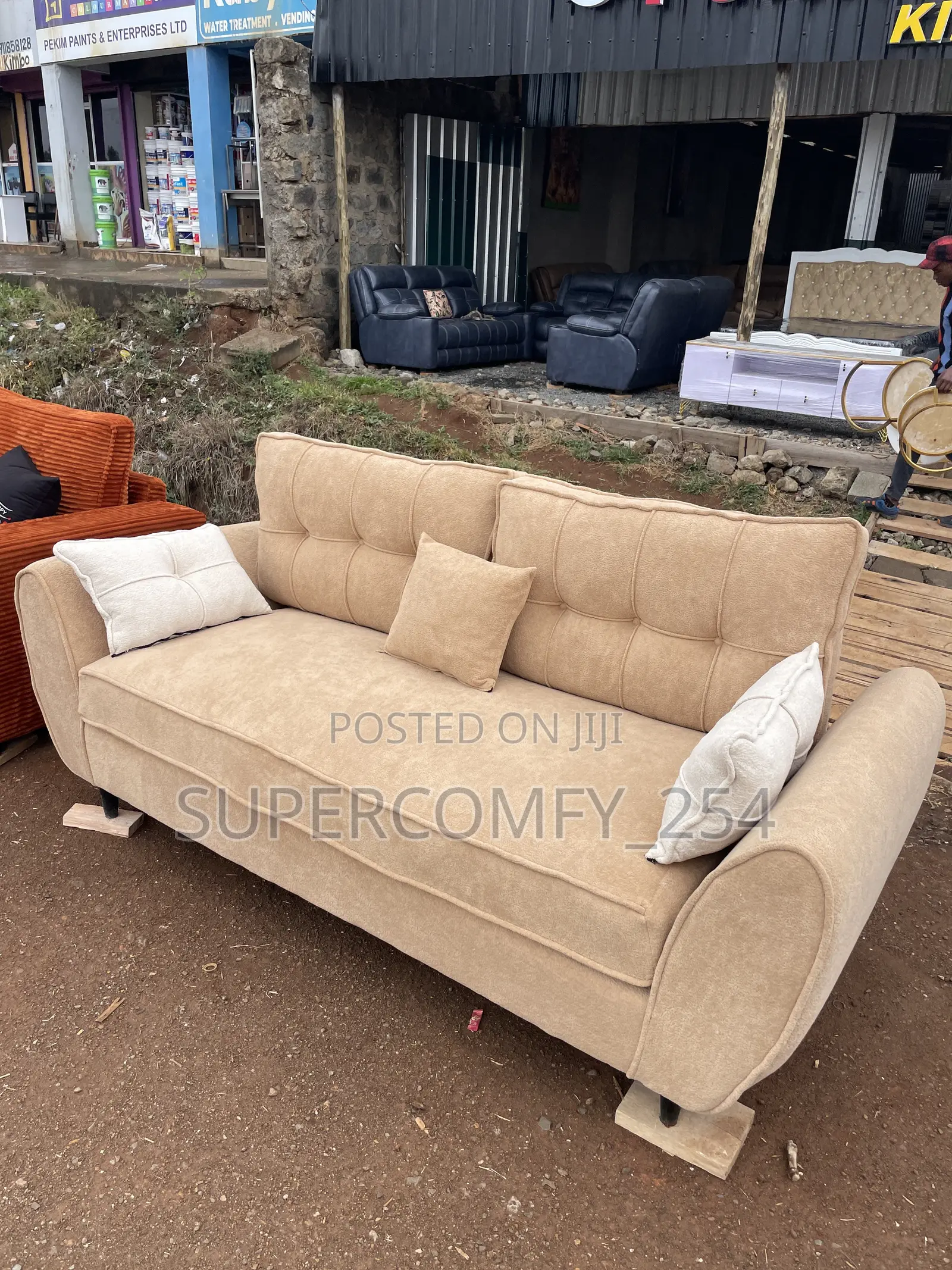 A Classic Three Seater Butterfly Super Sofa