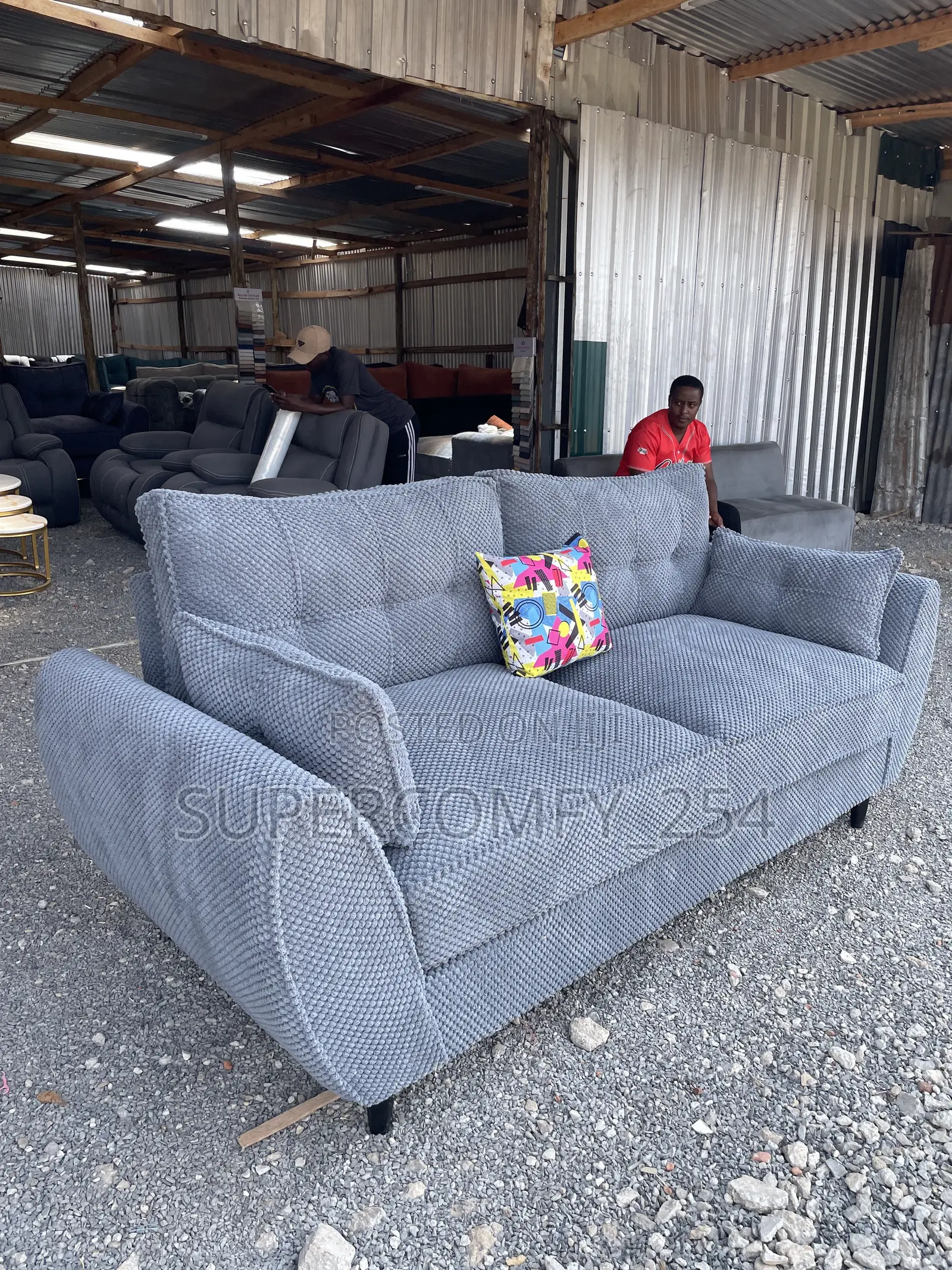 A Classic Three Seater Butterfly Super Sofa