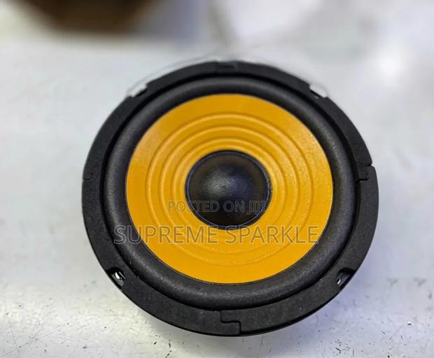 Generic 6.5-Inch Yellow Cone Woofer Speaker.