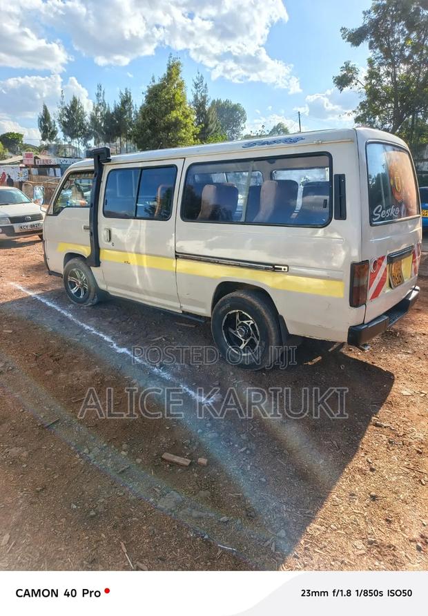 Nissan Caravan (Urvan) 2012 White - thumbnail 2