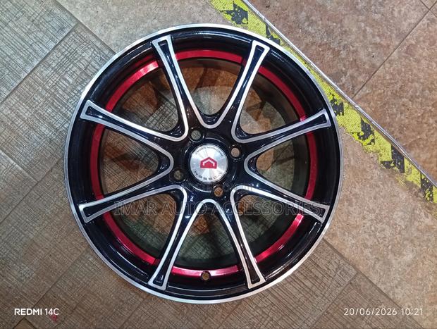15-Inch 4-Hole Black Machined Alloy Wheel Rim With Red Lip