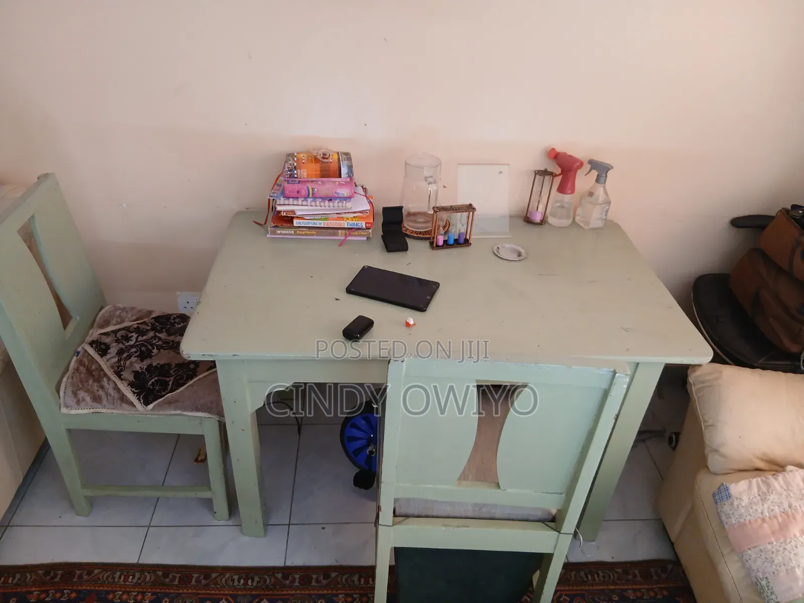It's a Set of Dinning Table With Two Chairs
