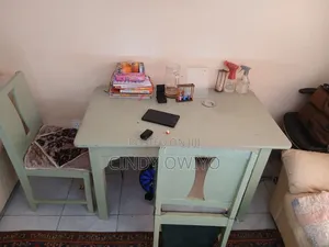 It's a Set of Dinning Table With Two Chairs