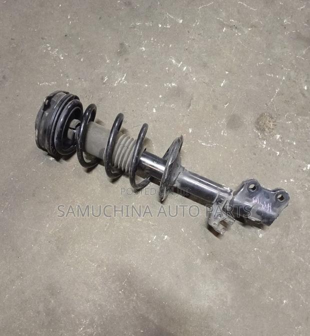 Front Shock Nissan Tiida