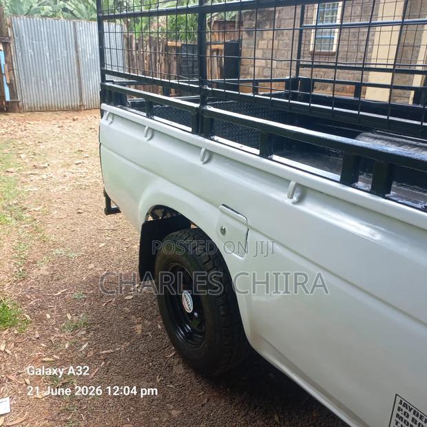 Nissan Pick-Up 1999 White - thumbnail 8