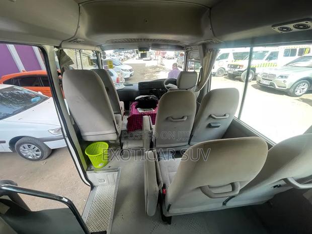 Toyota Coaster 2014 White - thumbnail 4