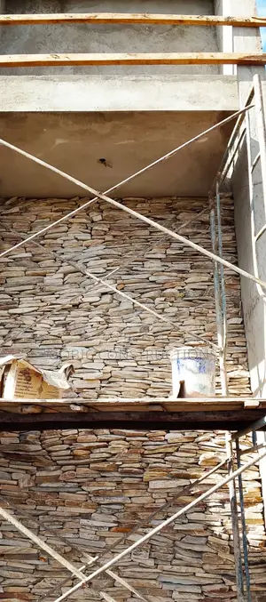 Tilling and Cladding Works