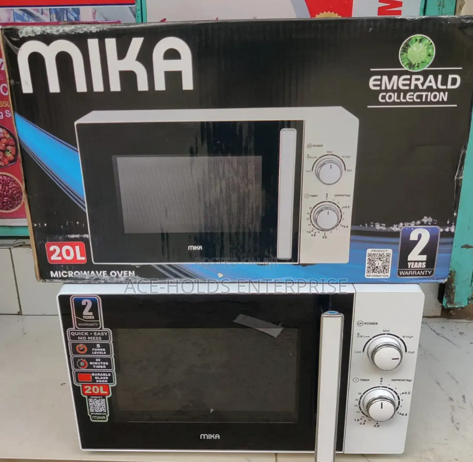 Mika Microwave Oven - 20 Litres Manual/ Analog (White)