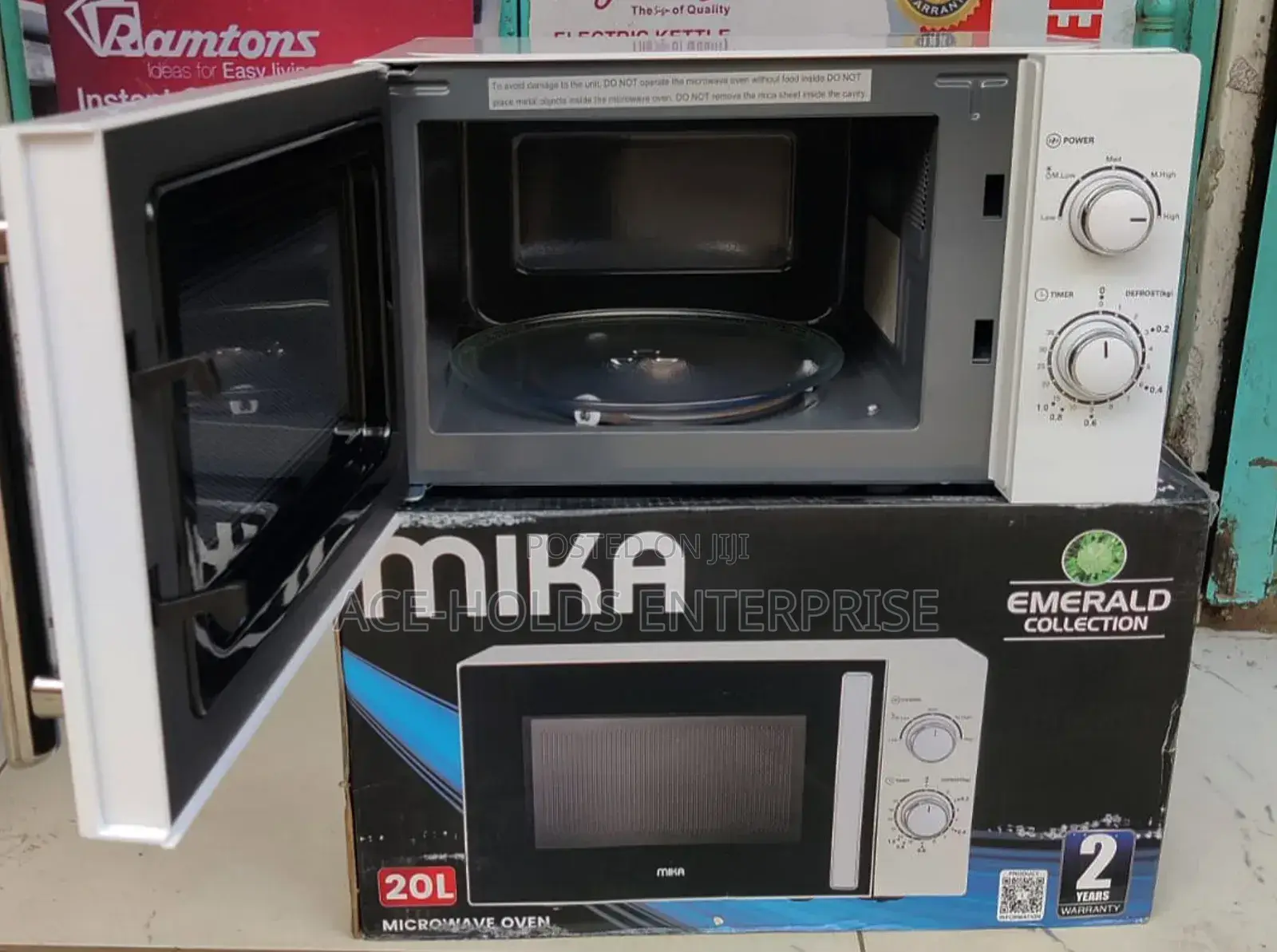 Mika Microwave Oven - 20 Litres Manual/ Analog (White)