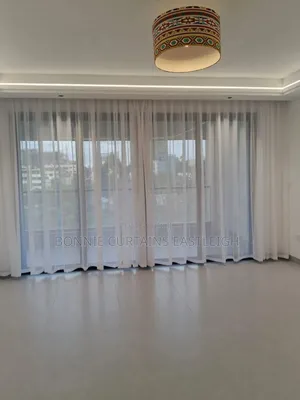 Modern White Sheers With Rings