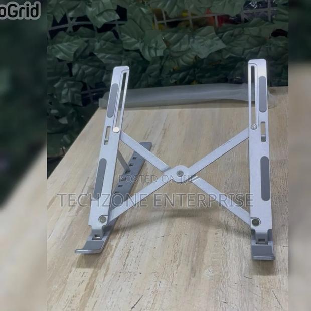*Metallic Foldable Laptop Stand Fits Up to 15 Inches
 