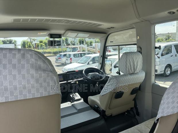 Toyota Coaster 2019 White - thumbnail 3