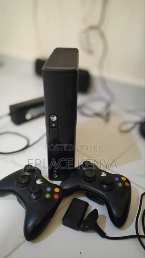 Xbox 360e With 12 Games and All Accessories