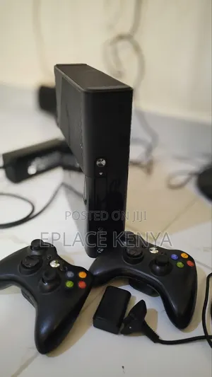 Xbox 360e With 12 Games and All Accessories