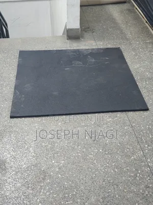 Heavy-Duty Rubber Floor Tile or Shock-Absorbing Rubber Mat)