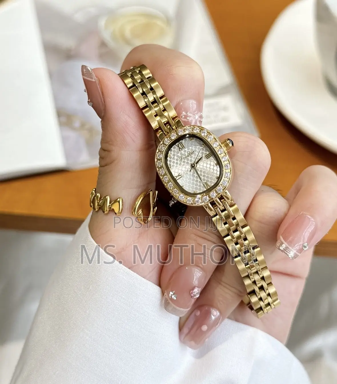 Textured Dial and a Diamond-Studded Bezel. Scottie Ladies Watch