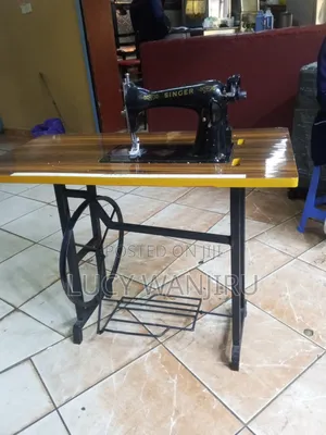 Brand New Singer Sewing Machine With Local Table