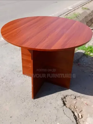 Round Conference Table With a Pedestal Base