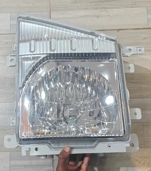 Headlamp Isuzu Elf 100p