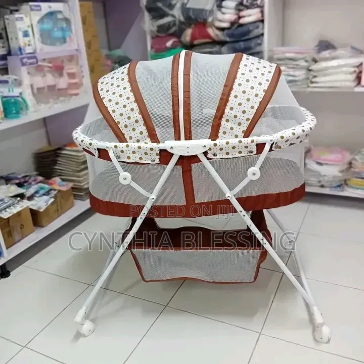 Portable Bassinet: Foldable With Net and Wheels