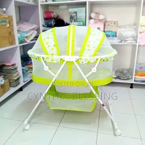 Portable Bassinet: Foldable With Net and Wheels