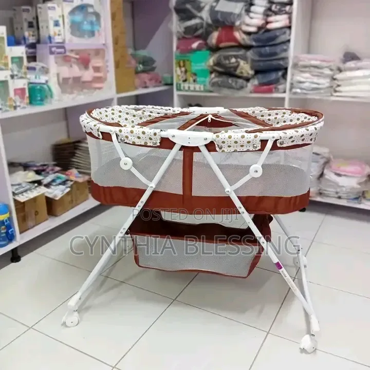 Portable Bassinet: Foldable With Net and Wheels