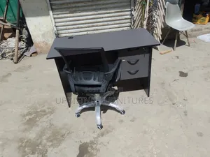 Sleek Gray Office Desk With Mesh Chair