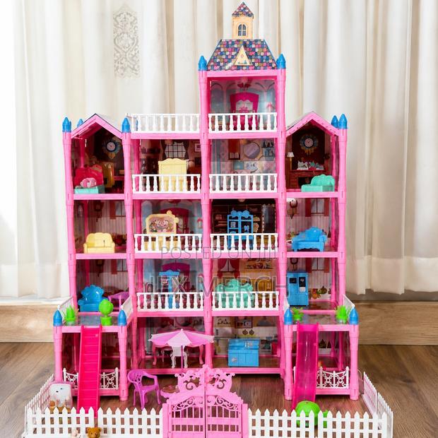 Pink 3 Story Dollhouse With Furniture and Dolls