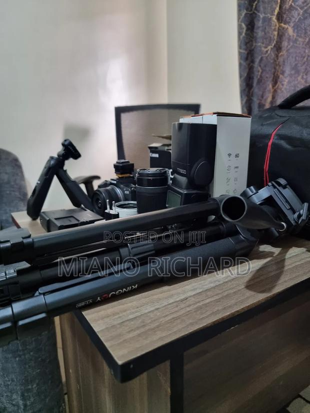 A Barely Used Canon Eos R50, Speedlite,Tripod. - thumbnail 3