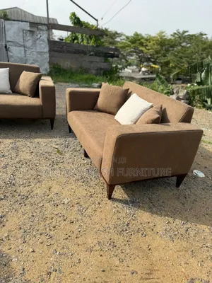Brown 2-Seater Sofa+ Free Delivery