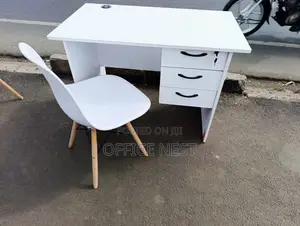White Office Desk With Eames Chairs