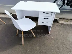 White Office Desk With Eames Chairs