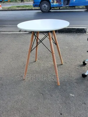 White Round Eames Table 4 Legged Wooden