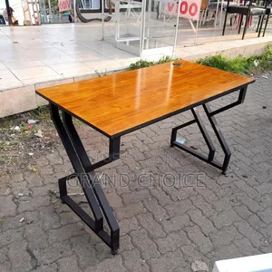 Metallic Table With X Shape Stand