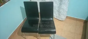 I'm Selling Two Black Chairs. Anyone Willing to Buy Call Me.