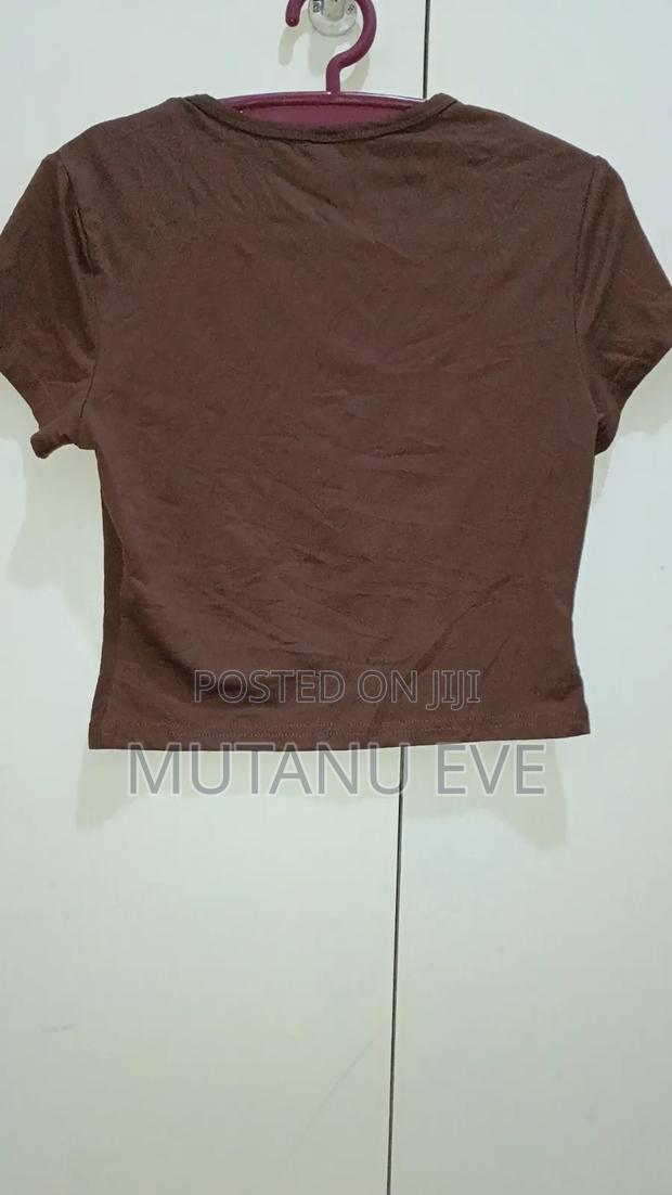 Brown Cropped Shirt. Never Worn, Good Material